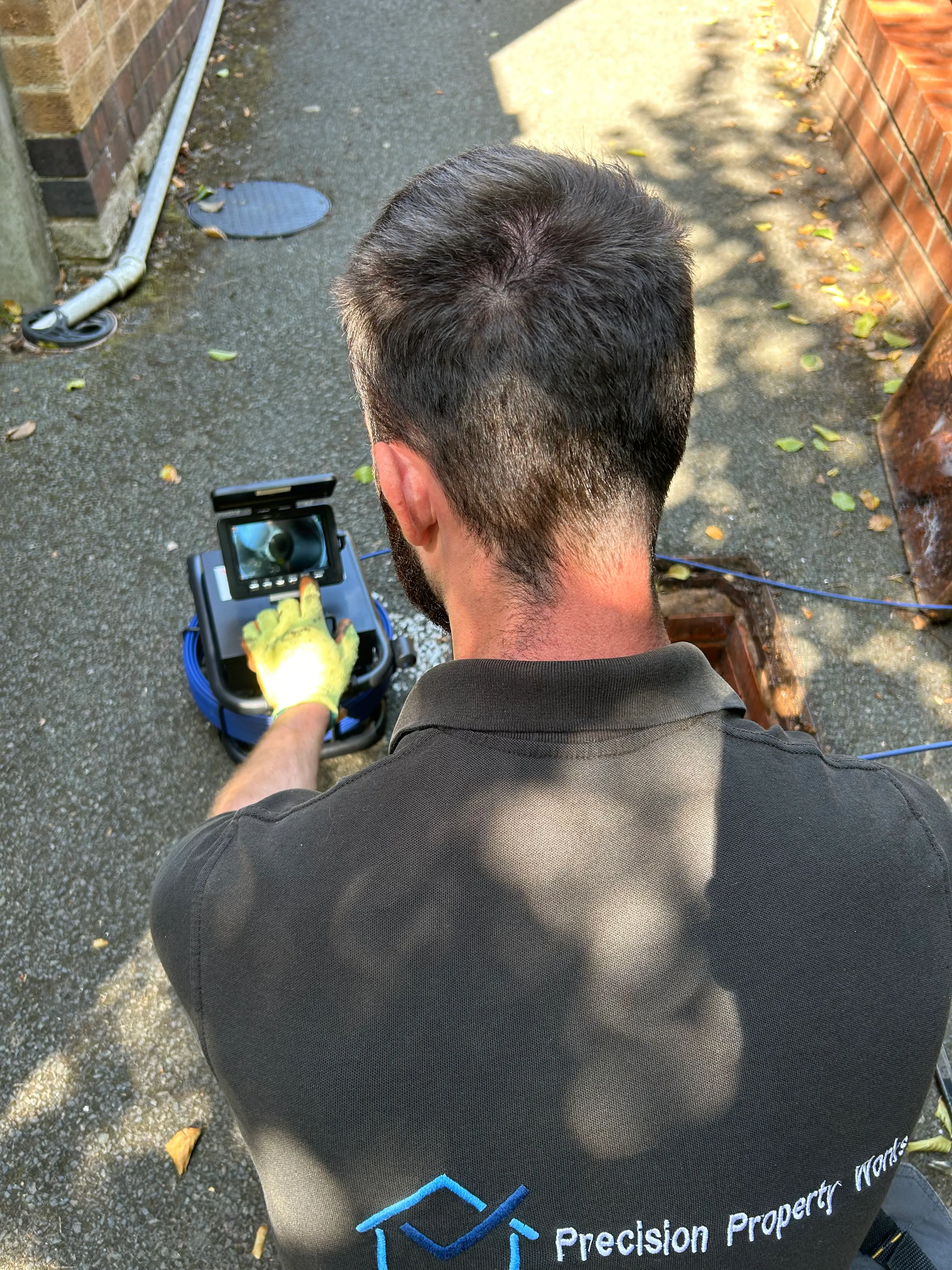 Drain camera footage being reviewed on screen during a CCTV drain survey