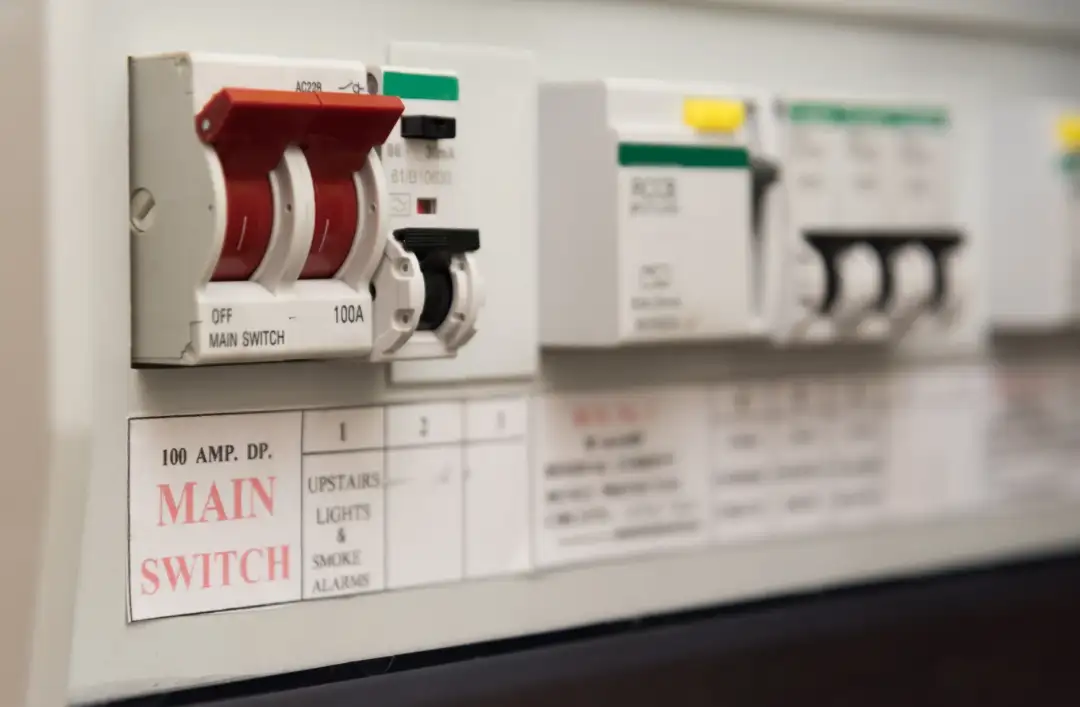 Consumer unit with a 100 amp main switch, RCDs and labelled circuits
